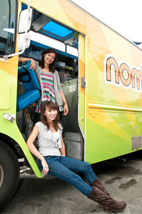 Jen and Chien on the steps of the Nom Nom Truck